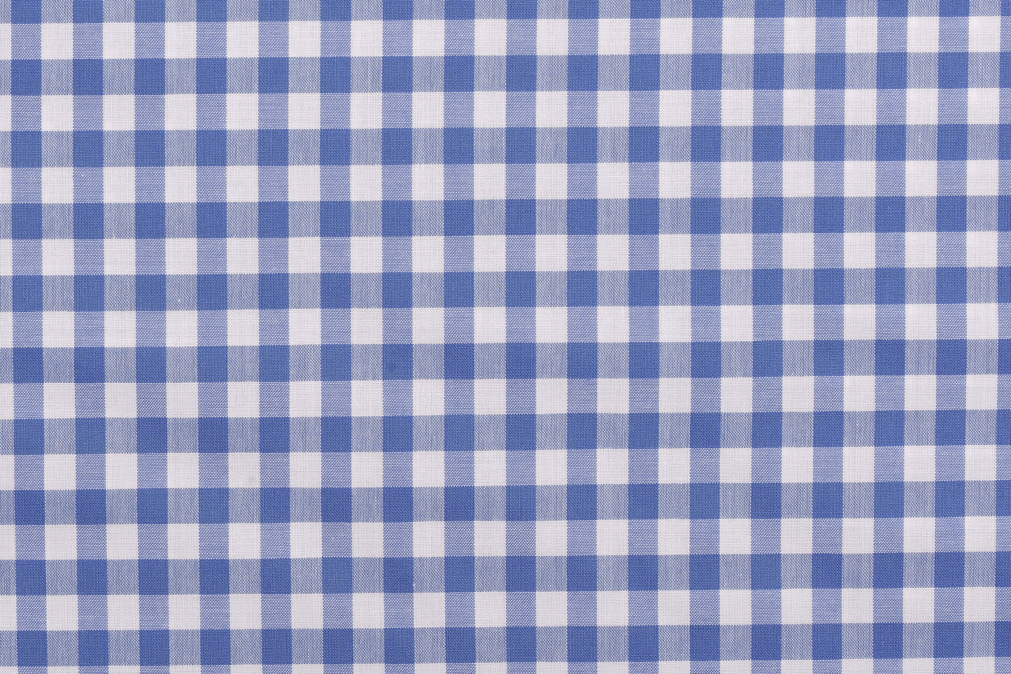 Closeup view of custom check shirts for men by Luxire light blue checks on white