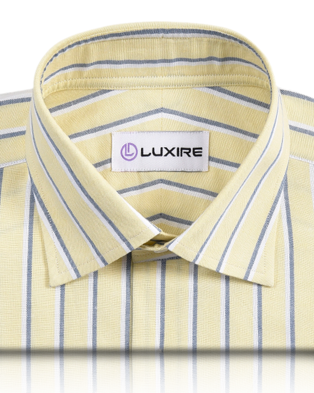 Collar of the custom oxford shirt for men by Luxire in pale yellow with indigo and white stripes