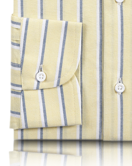 Cuff of the custom oxford shirt for men by Luxire in pale yellow with indigo and white stripes
