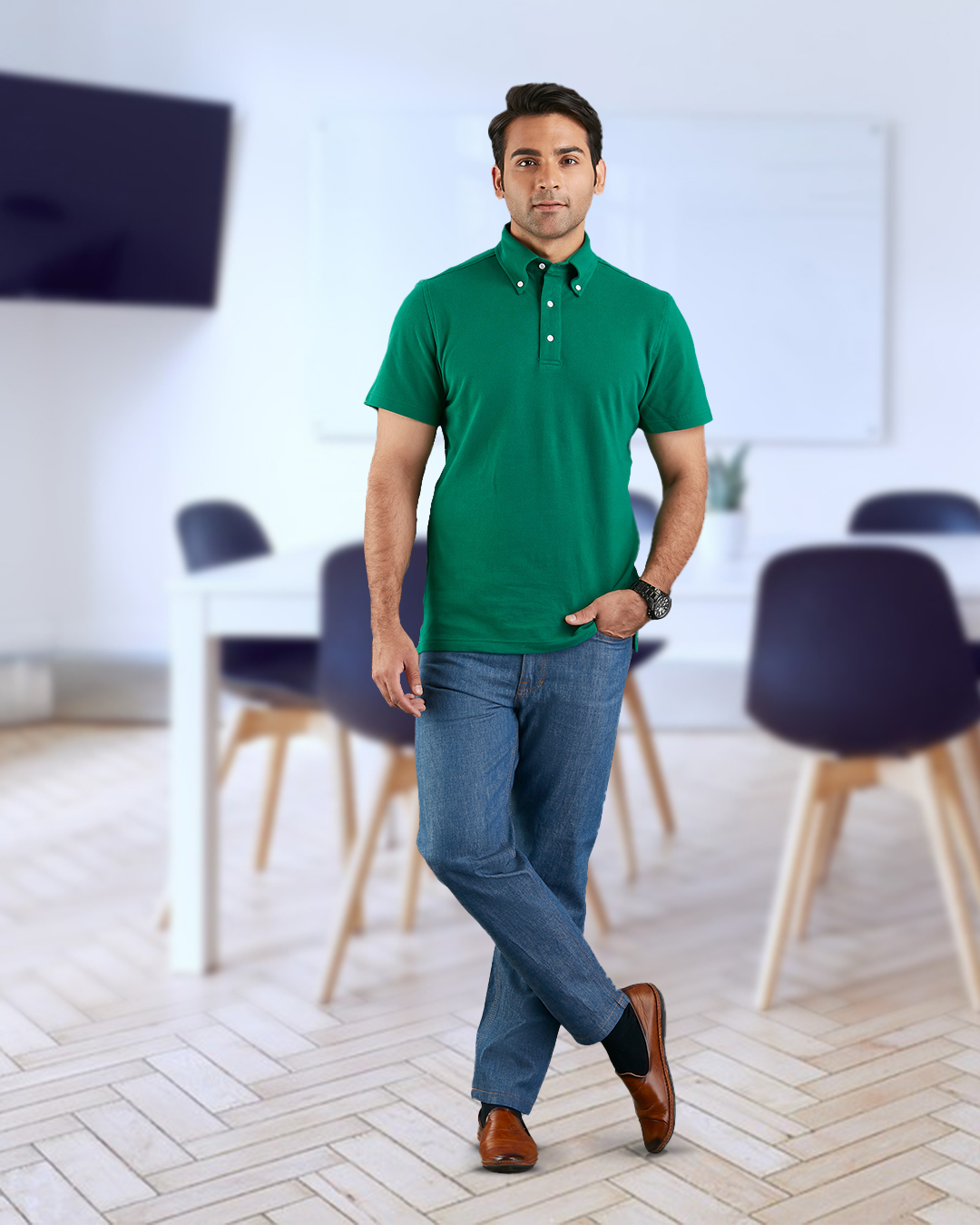 Model wearing the custom oxford polo shirt for men by Luxire in racing green hand in pocket
