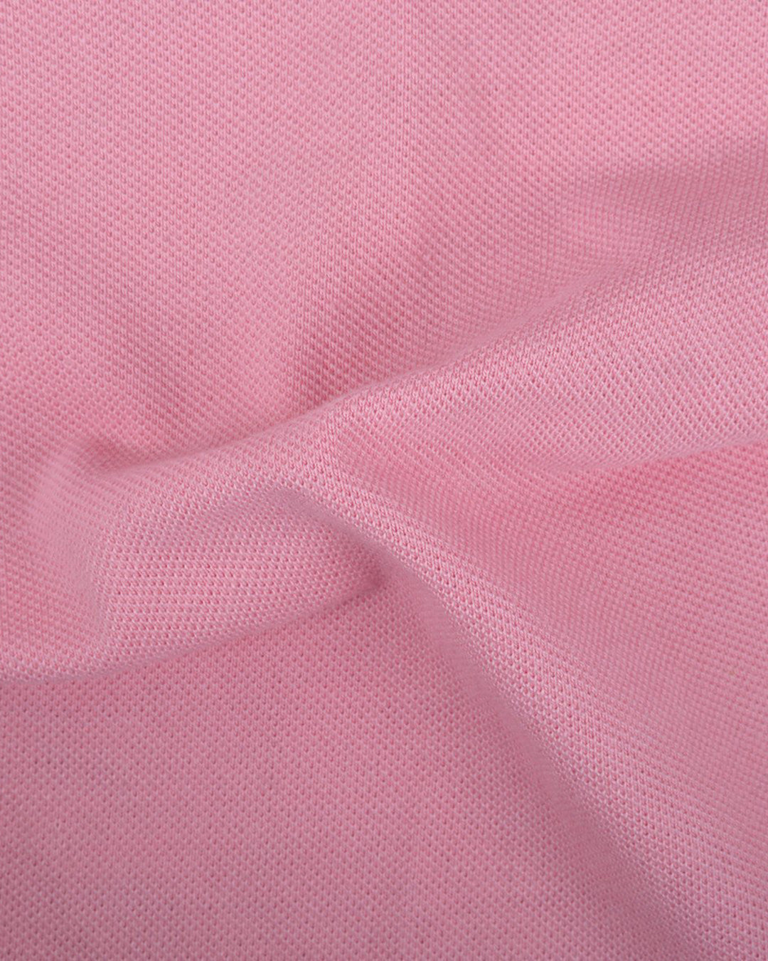Close up of the custom oxford polo shirt for men by Luxire in mid pink
