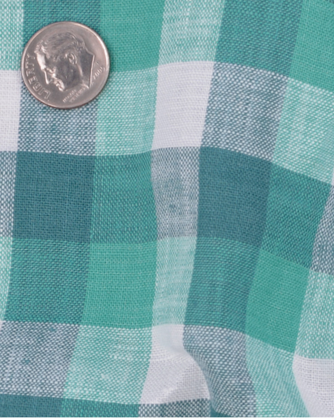 Close up of the custom linen shirt for men in shades of green by Luxire Clothing