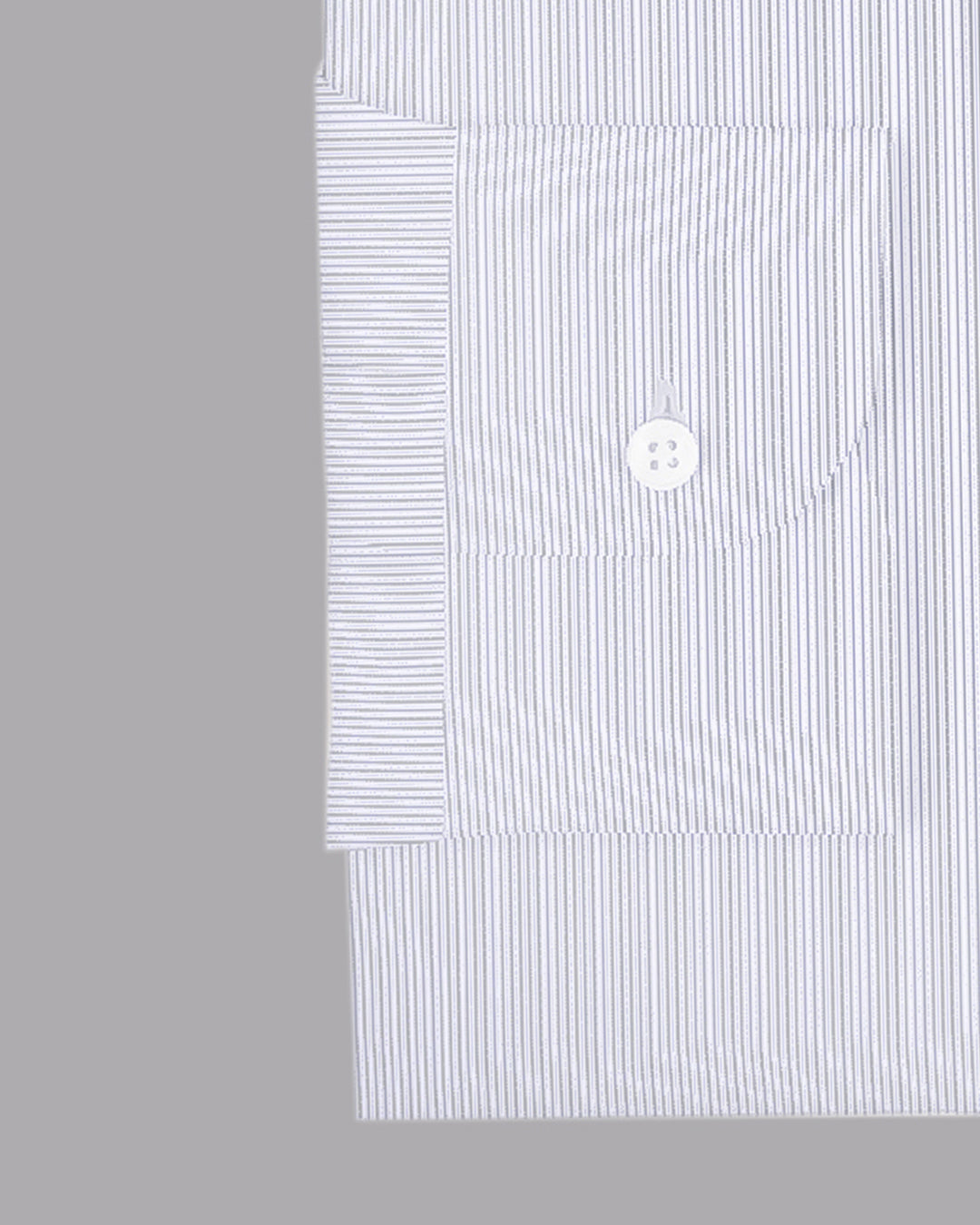 Cuff of the custom linen shirt for men in white with ink blue stripes by Luxire Clothing