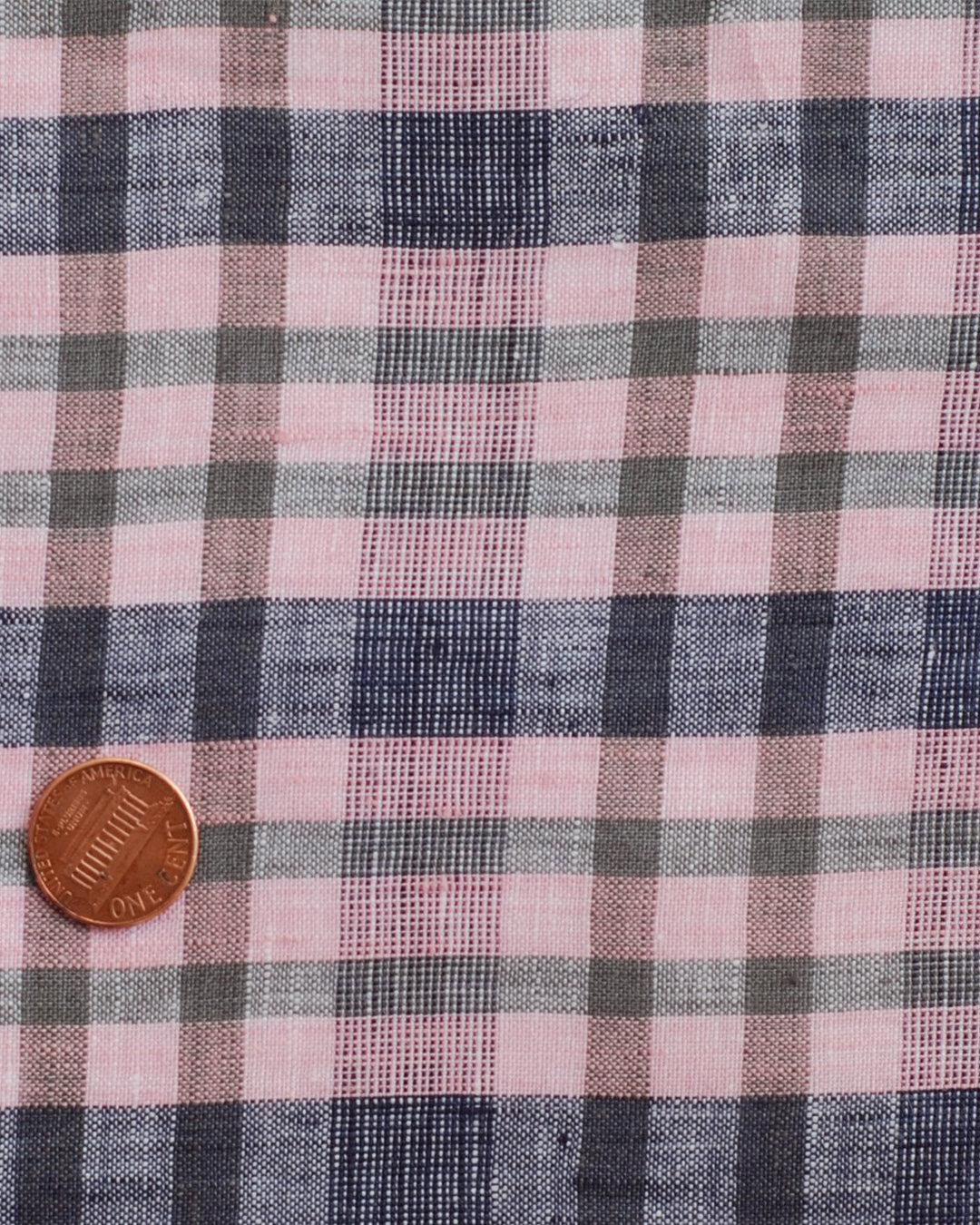 Close up of custom linen shirt for men by Luxire in pink and navy checkered