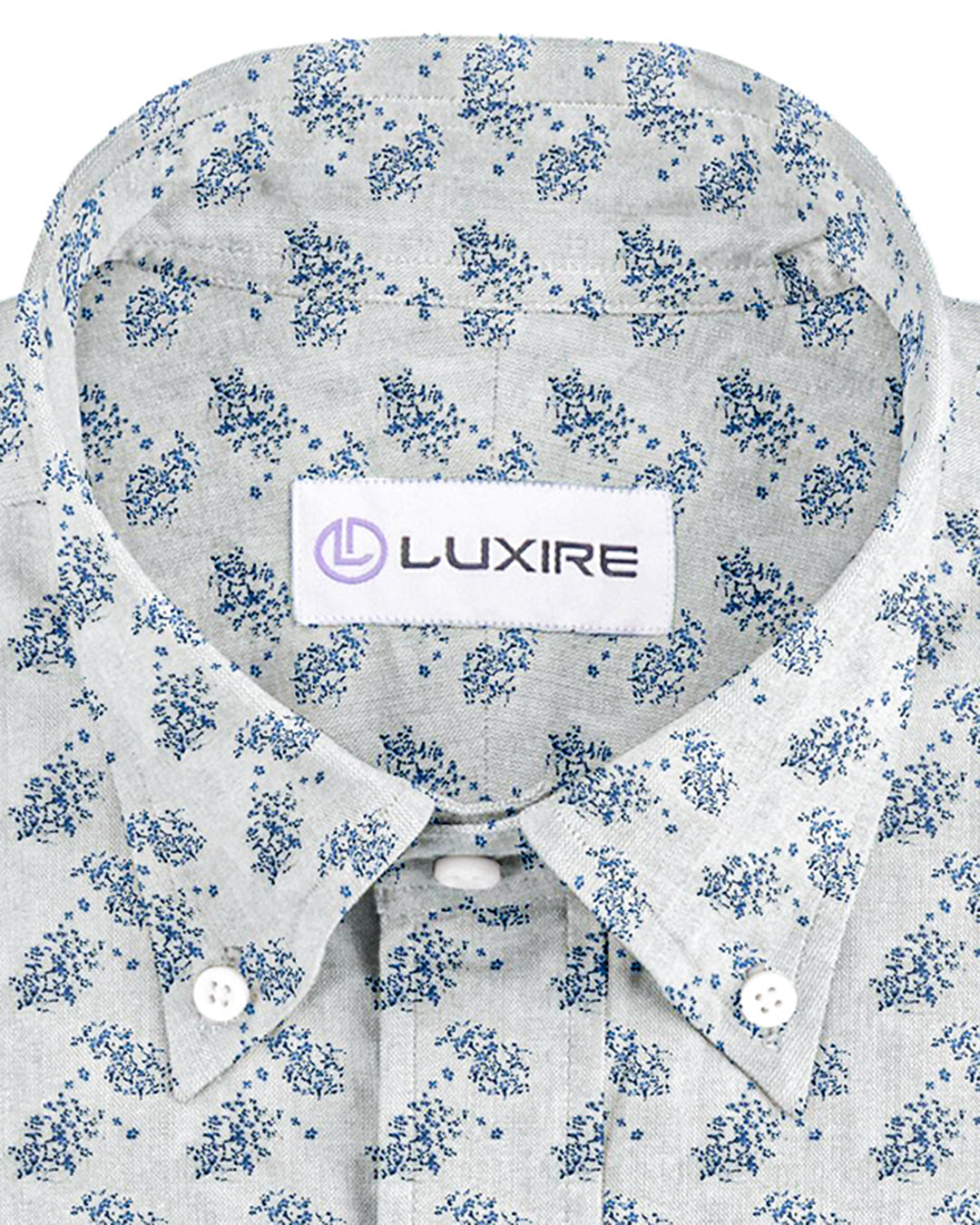 Front close up view of custom linen shirt for men in pale blue printed shrubs