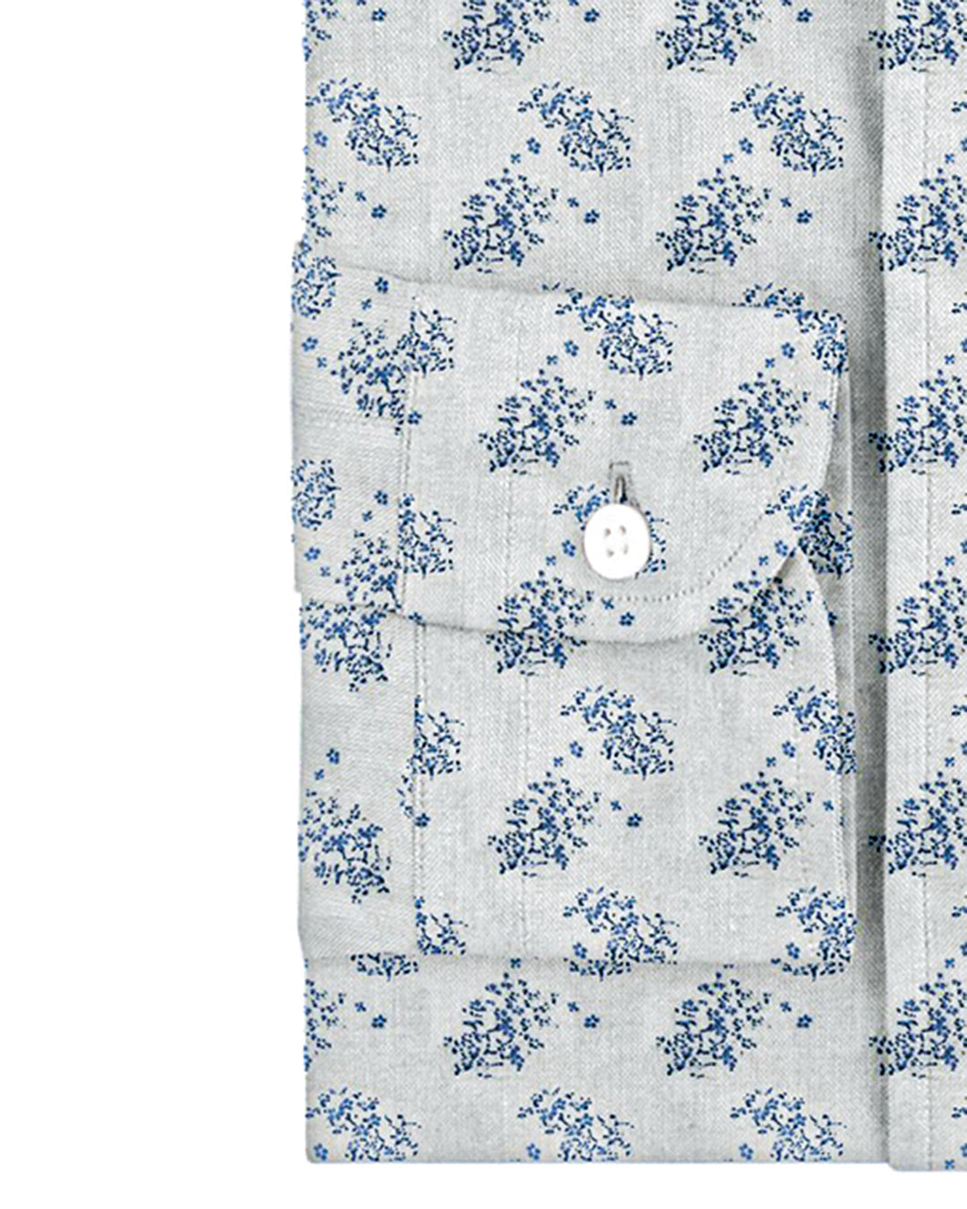 Cuff of custom linen shirt for men in pale blue printed shrubs