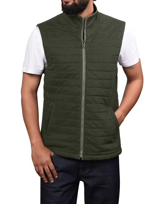 Model wearing the quilted vest for men by Luxire in green twill