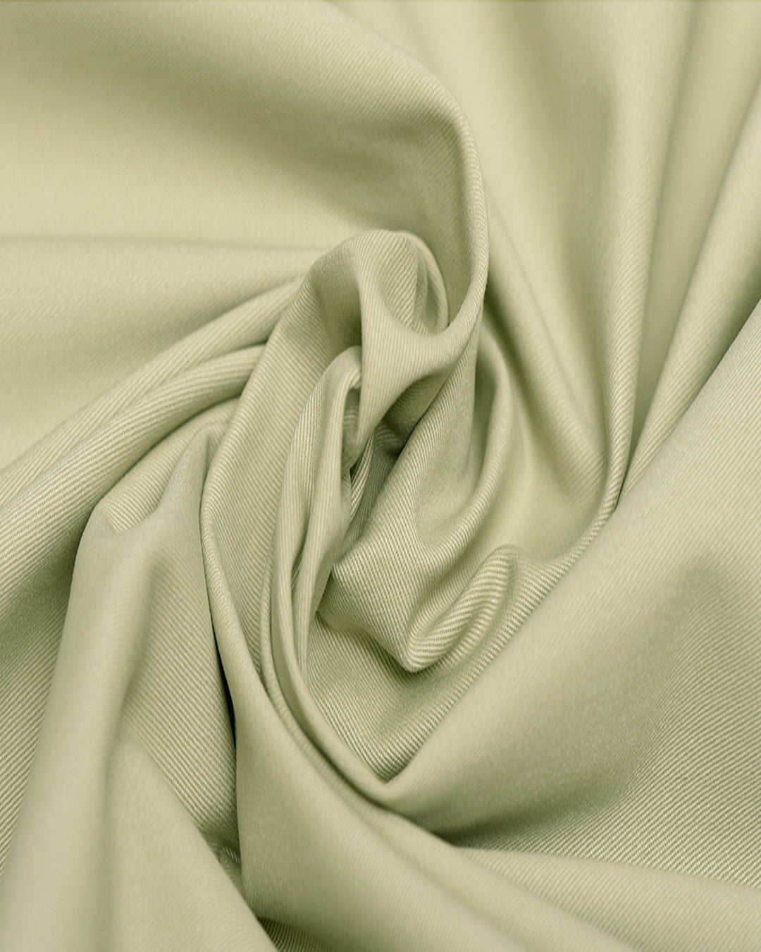 Closeup view of custom Genoa Chino pants for men by Luxire in pale lime
