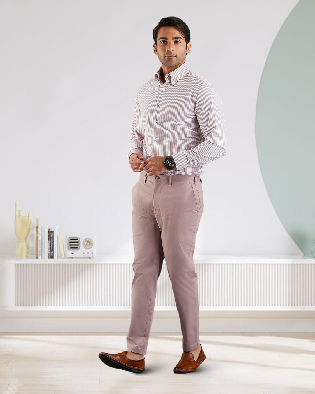 Model wearing custom Genoa Chino pants for men by Luxire in purple fade hands together