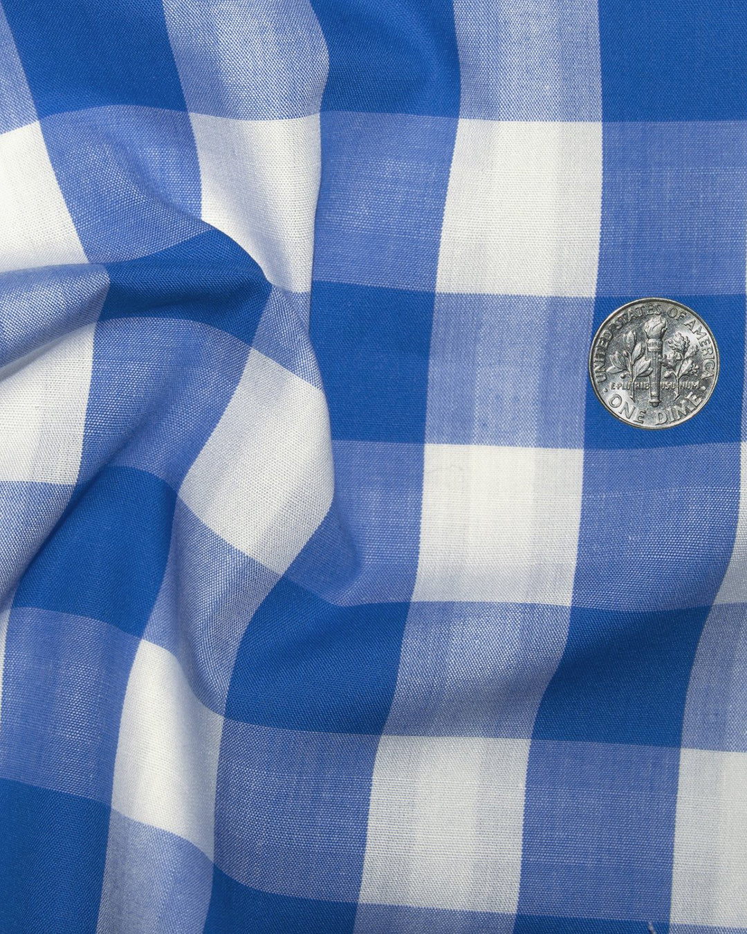 Closeup view of custom check shirts for men by Luxire in blue white macro