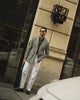 Model outside wearing mens heavy twill jeans by Luxire in white 4