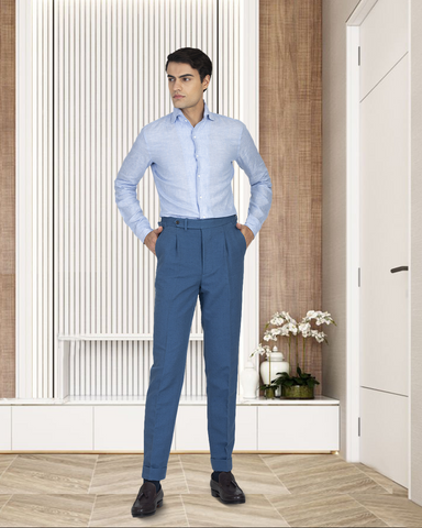 Male model in custom linen Gurkha pants for men by Luxire in steel blue