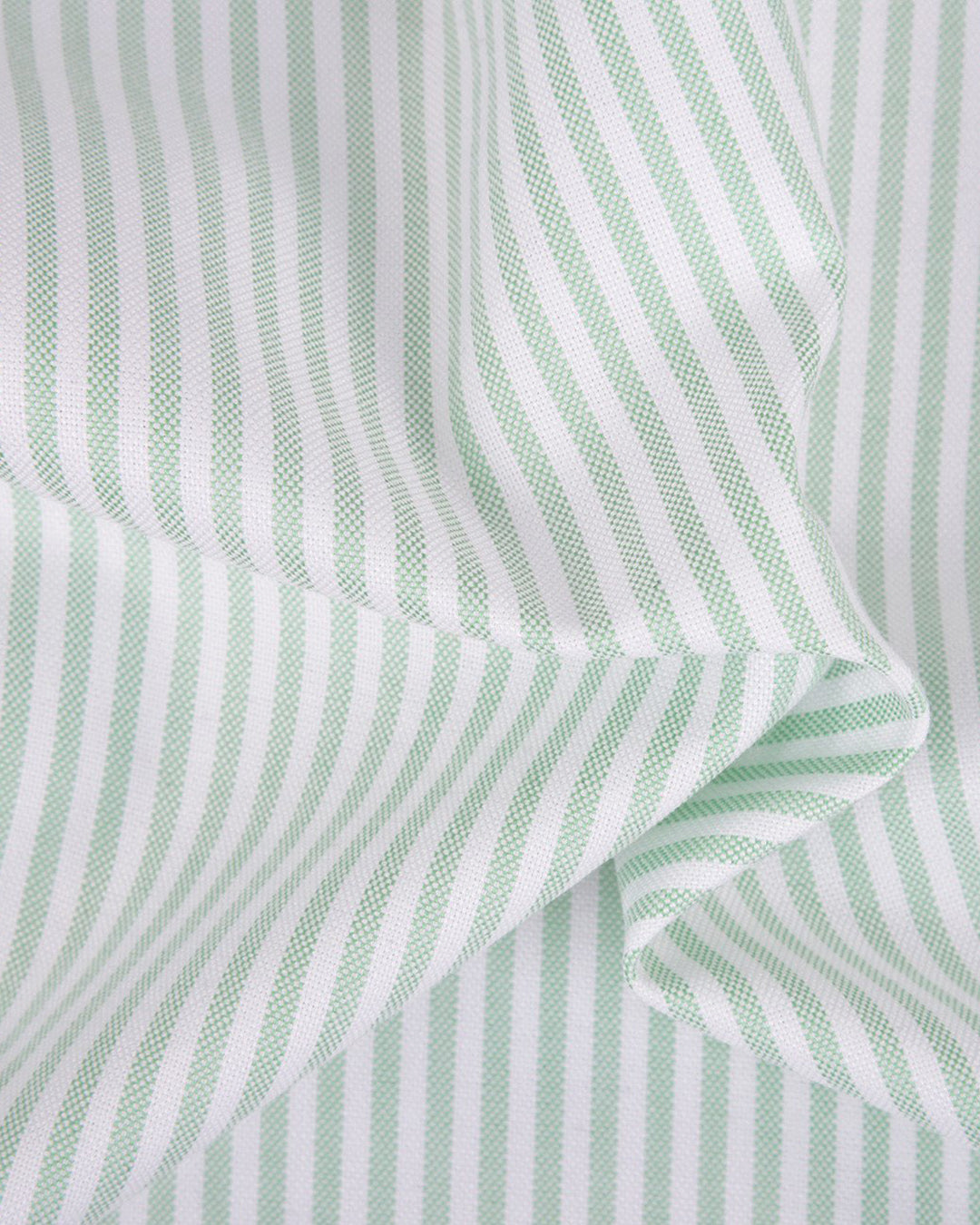 Close up of the custom oxford shirt for men by Luxire in shades of green 2