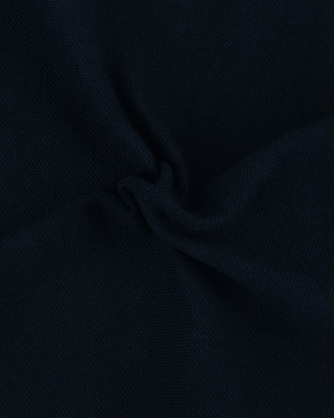 Close up fabric of the custom oxford polo shirt for men by Luxire in dark navy
