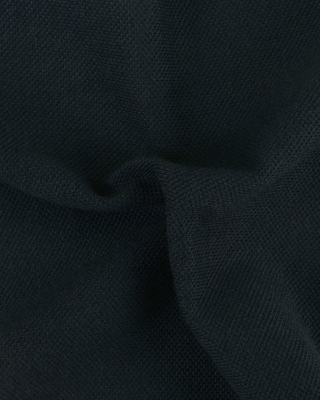 Close up of the custom oxford polo shirt for men by Luxire in faded navy