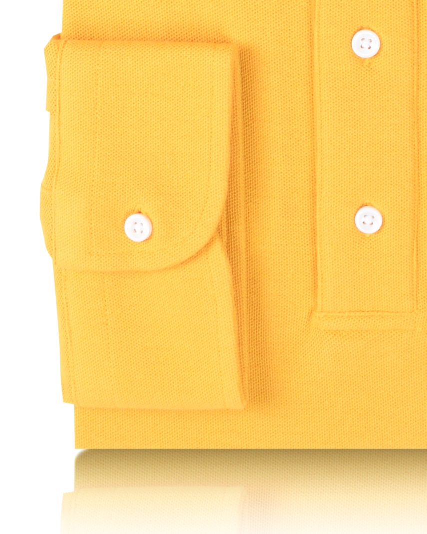 Cuff of the custom oxford polo shirt for men by Luxire in golden yellow
