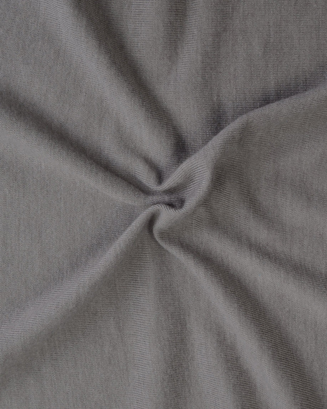 Close up fabric of the custom oxford polo shirt for men by Luxire in soft grey