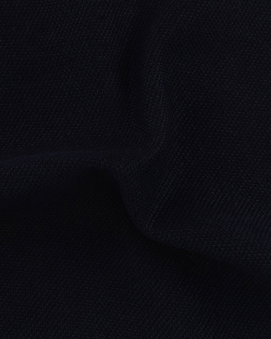 Close up fabric of the custom oxford polo shirt for men by Luxire in midnight navy