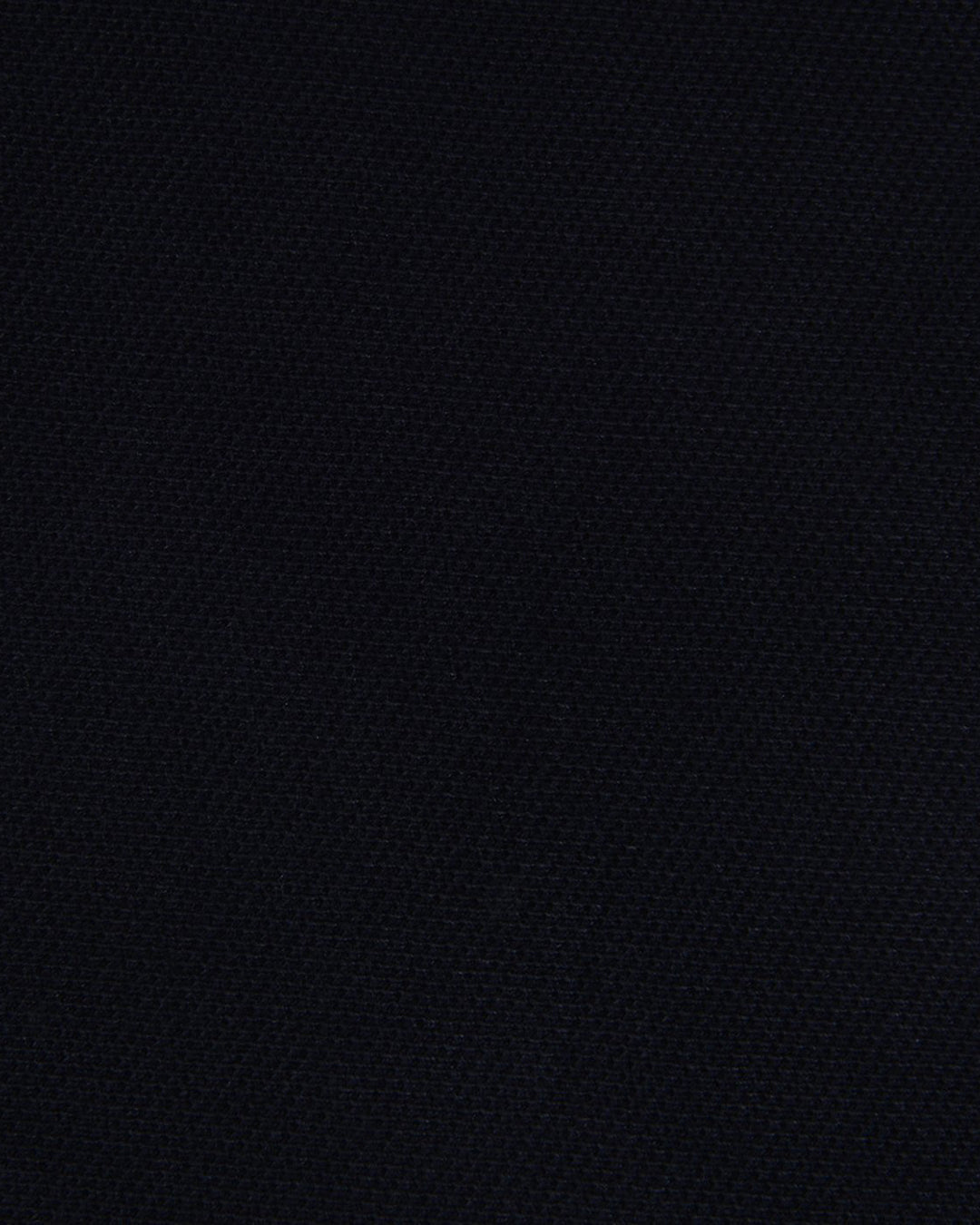 Close up of the custom oxford polo shirt for men by Luxire in midnight navy