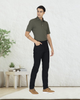 Model wearing custom overdyed jeans for men by Luxire in black