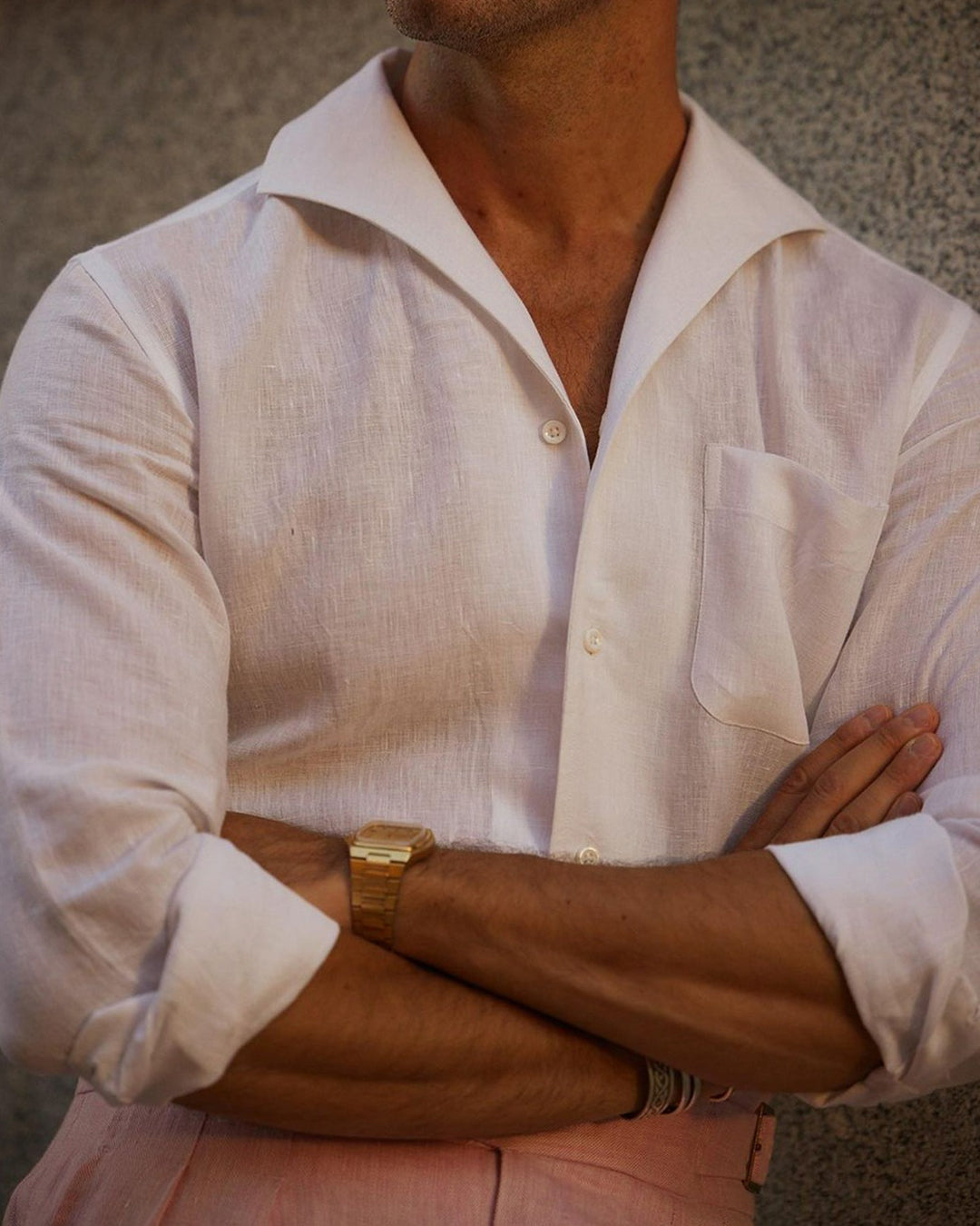 Model close up wearing the custom linen shirt for men in crisp white by Luxire Clothing 2