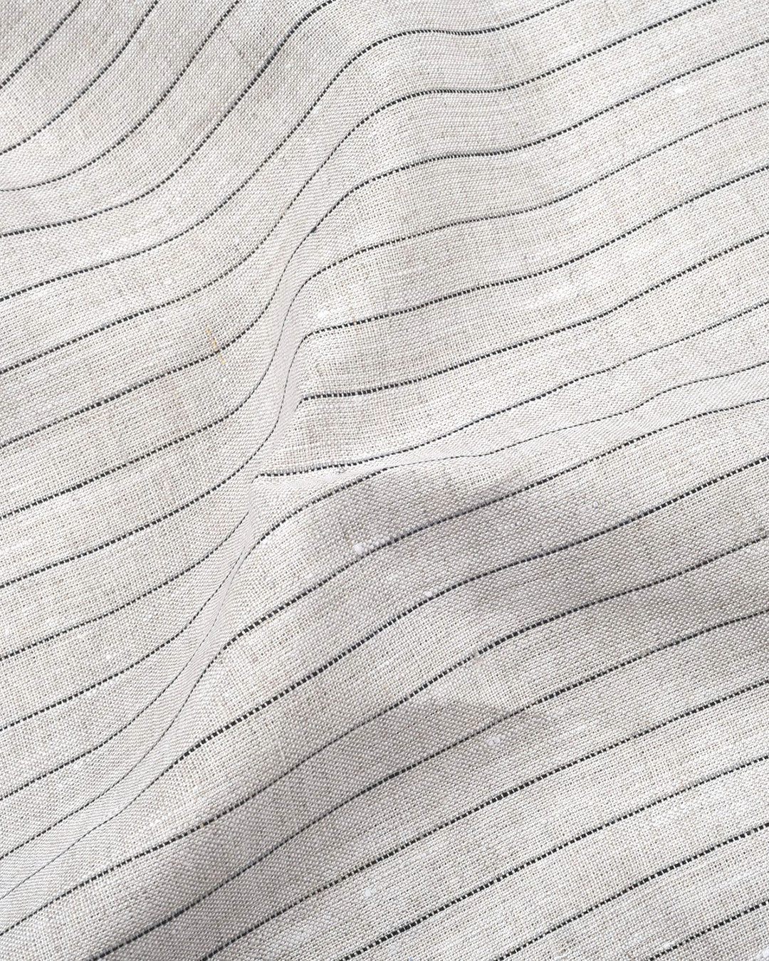 Close up of the custom linen shirt for men in lamb beige with wide stripes by Luxire Clothing 2