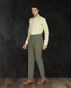 Model wearing the custom linen shirt for men in light olive green by Luxire Clothing 4