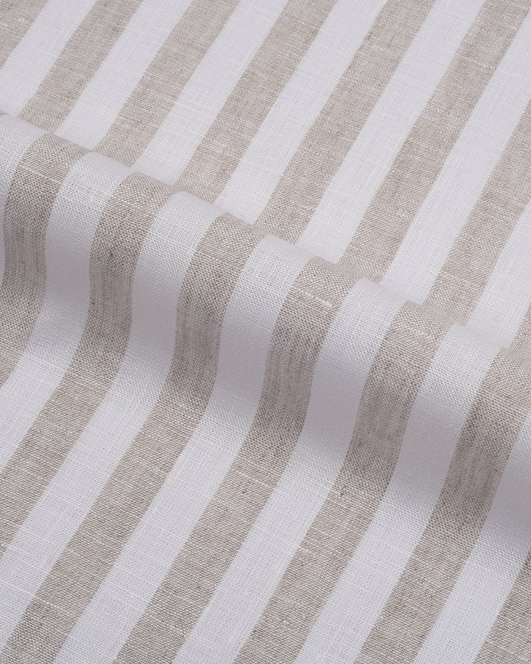 Close up of the custom linen shirt for men in white with sand stripes by Luxire Clothing