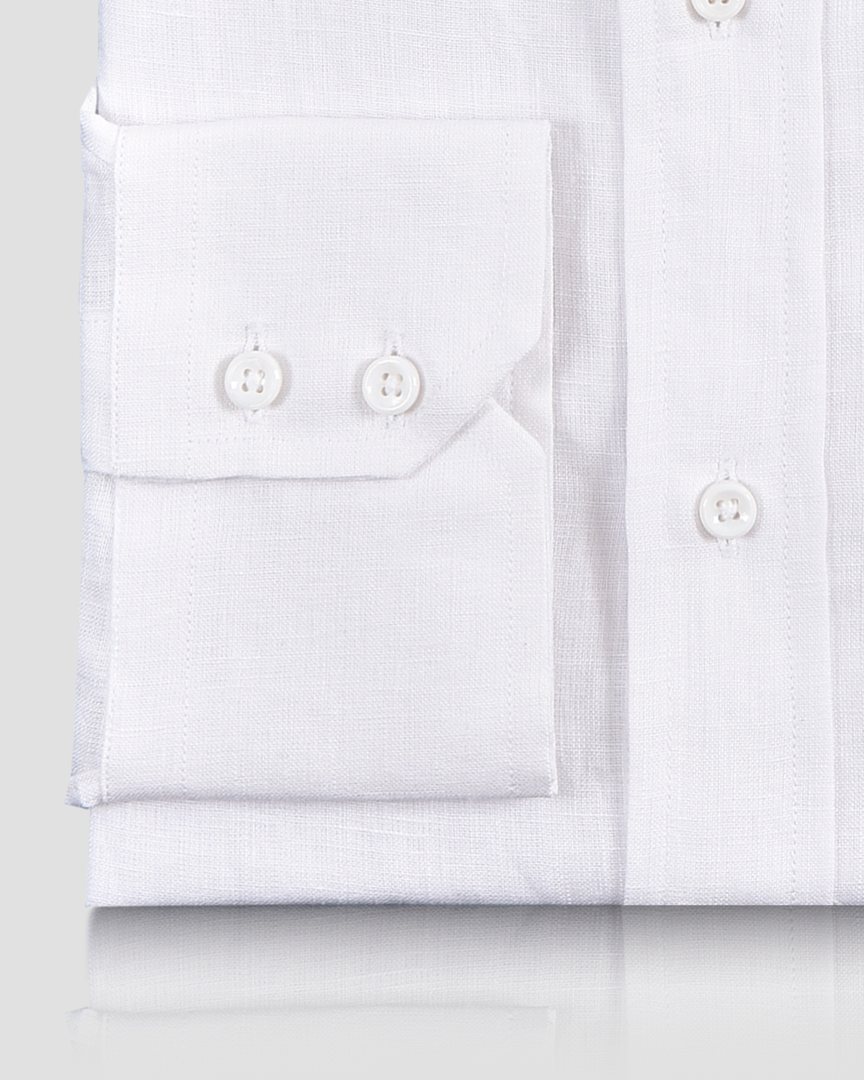 Close view of cuff on custom linen shirt for men by Luxire in white