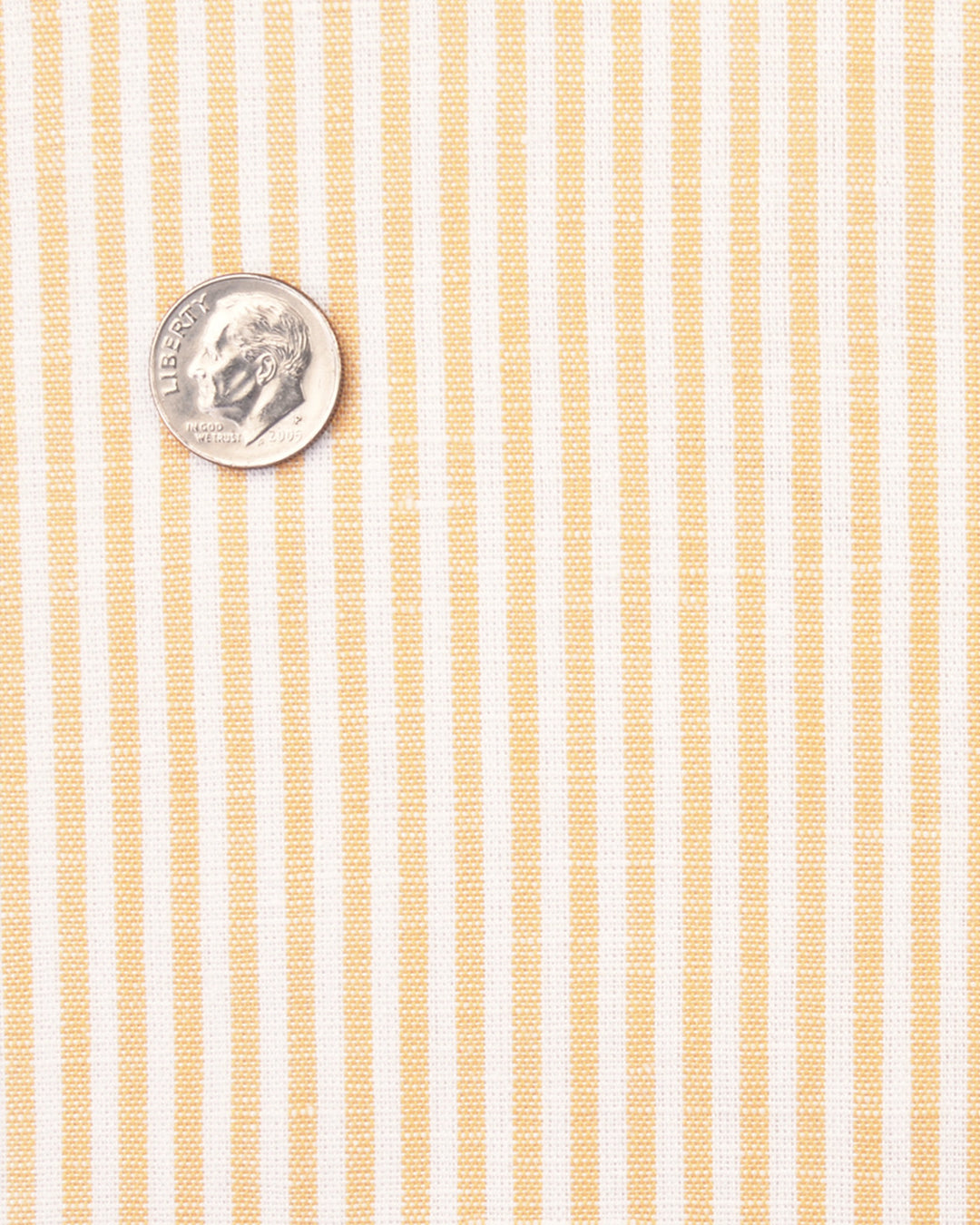 Close up of the custom linen shirt for men in yellow candystripes by Luxire Clothing