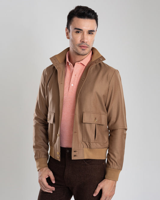 Model wearing the flannel shirt jacket for men by Luxire in sand with rib collar